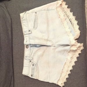 Free people lace trimmed jean shorts